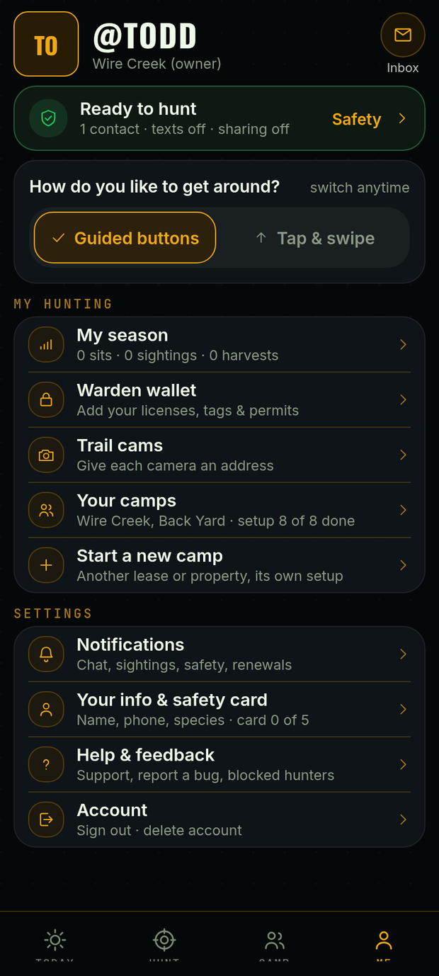 Me screen: Ready to hunt with an emergency contact, the Guided buttons or Tap and swipe switch, My season, Warden wallet, Trail cams, Your camps and Start a new camp